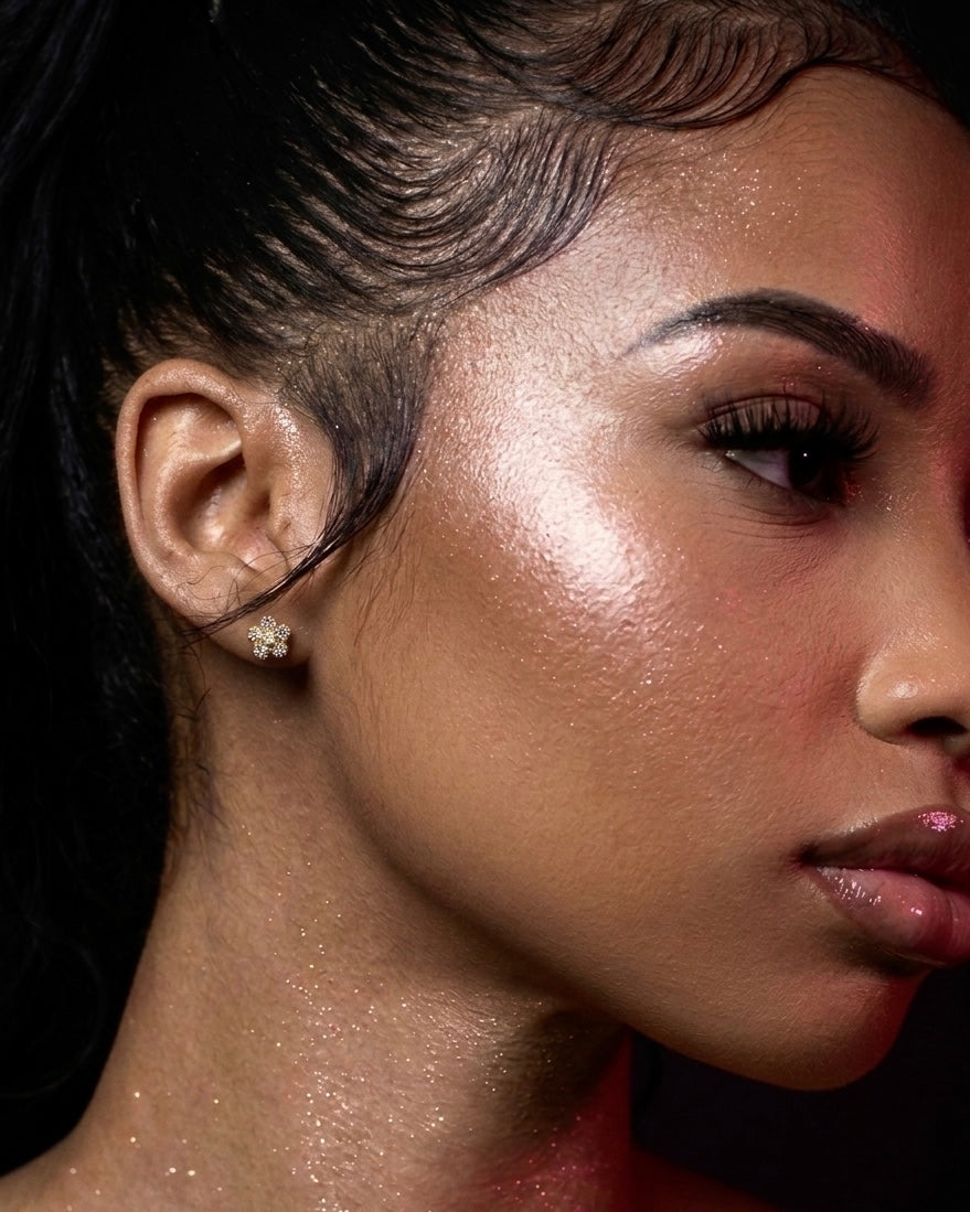 Model wearing 18k gold filled diamond flower stud earrings